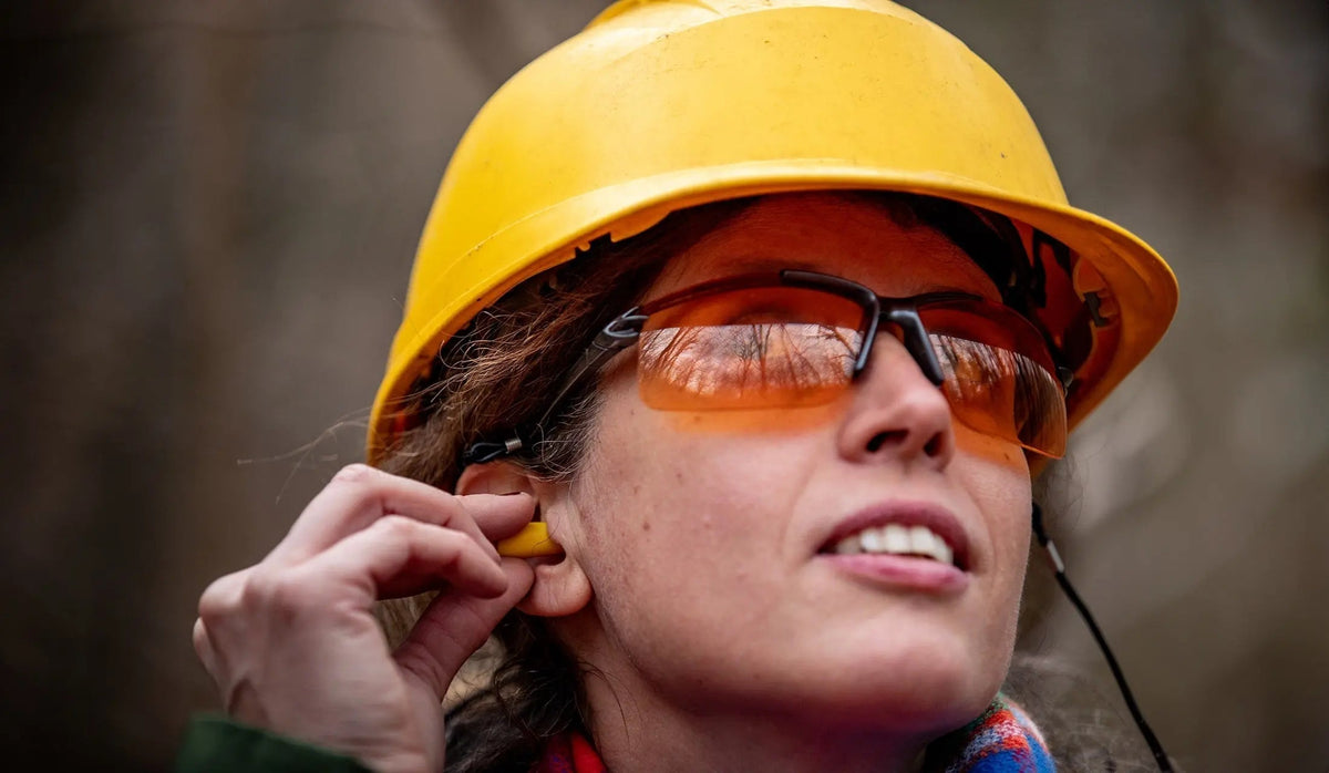 Woman using ear protection