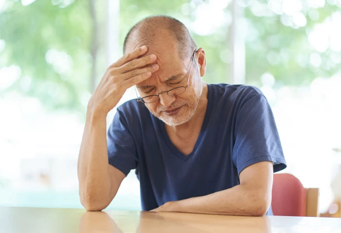 Man suffering from vertigo