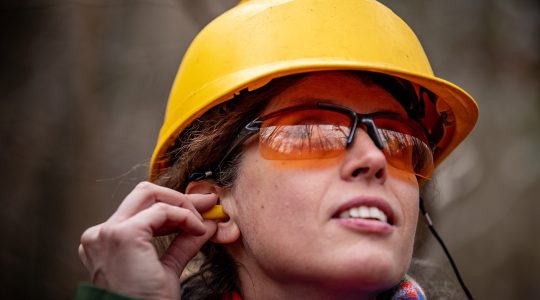 Woman using ear protection